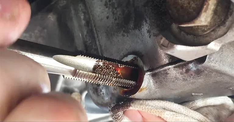stripped oil drain plug