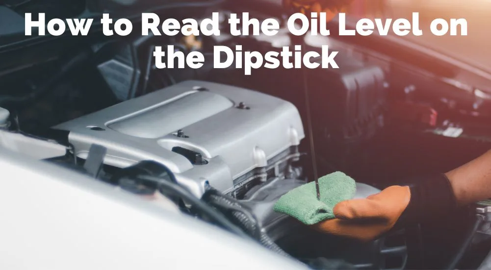 Toyota 0W-20 synthetic oil bottle and dipstick